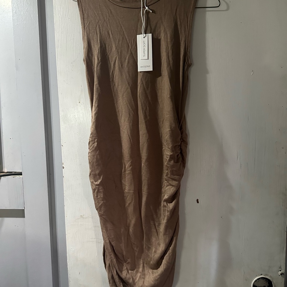 Brand New brown fitted dress.